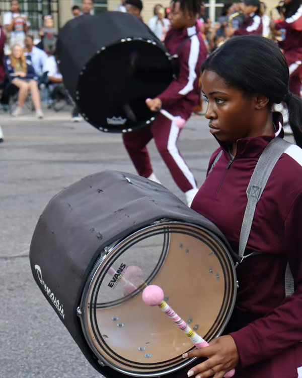 Zakiah Goodlow using a drum